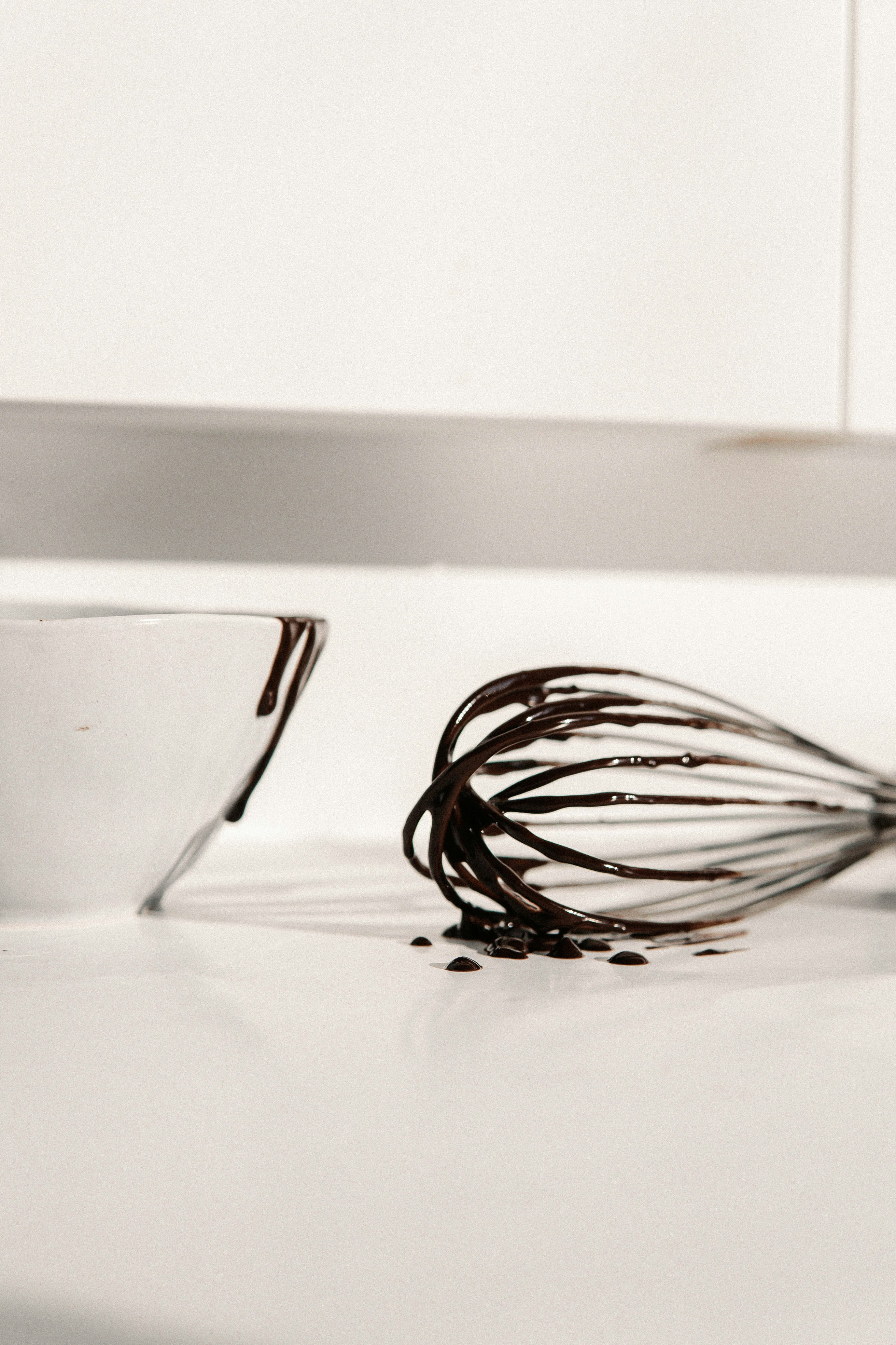 black and white coated wires on white ceramic bowl